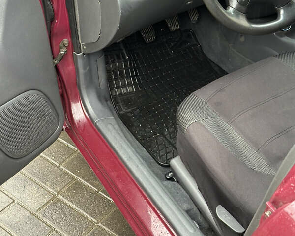 Червоний Деу Ланос, об'ємом двигуна 1.5 л та пробігом 225 тис. км за 2199 $, фото 24 на Automoto.ua