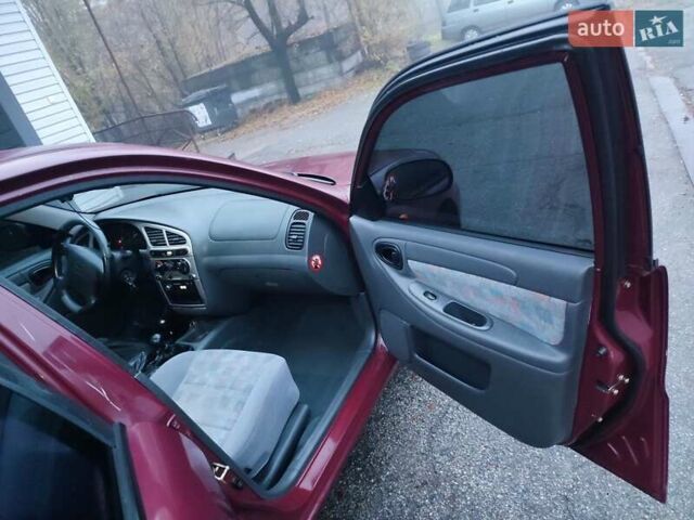 Красный Дэу Ланос, объемом двигателя 1.6 л и пробегом 244 тыс. км за 2850 $, фото 6 на Automoto.ua
