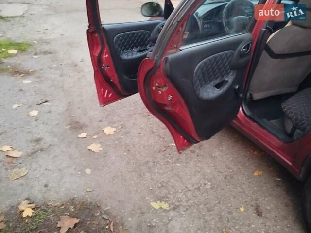 Червоний Деу Ланос, об'ємом двигуна 1.5 л та пробігом 230 тис. км за 1800 $, фото 12 на Automoto.ua