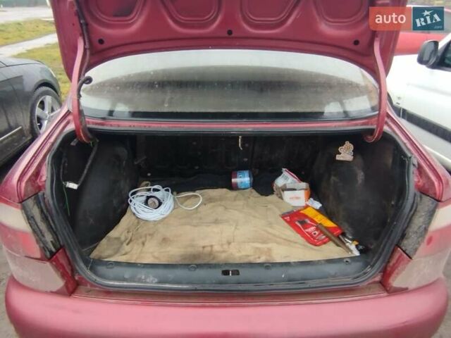 Красный Дэу Ланос, объемом двигателя 1.5 л и пробегом 245 тыс. км за 1100 $, фото 7 на Automoto.ua