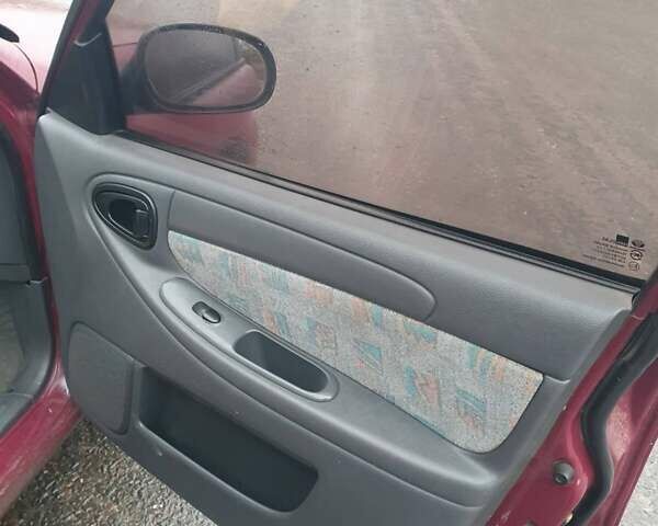 Красный Дэу Ланос, объемом двигателя 1.5 л и пробегом 226 тыс. км за 2400 $, фото 13 на Automoto.ua