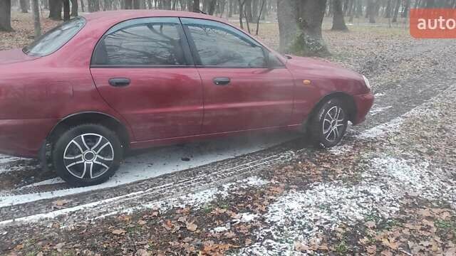 Красный Дэу Ланос, объемом двигателя 1.5 л и пробегом 260 тыс. км за 2500 $, фото 5 на Automoto.ua