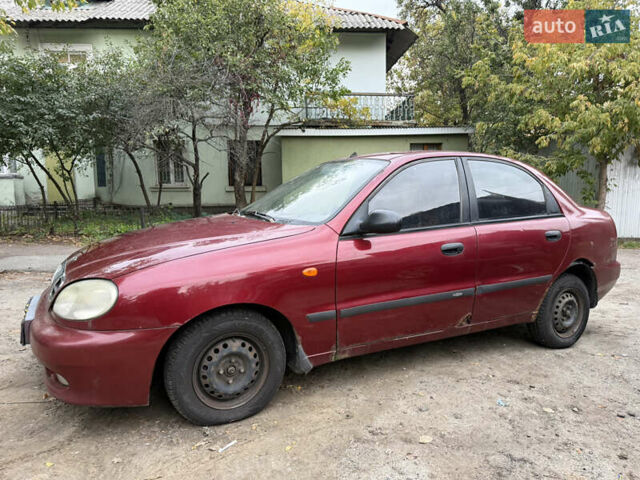 Красный Дэу Ланос, объемом двигателя 1.5 л и пробегом 375 тыс. км за 1400 $, фото 2 на Automoto.ua