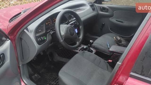 Красный Дэу Ланос, объемом двигателя 1.5 л и пробегом 260 тыс. км за 2500 $, фото 7 на Automoto.ua