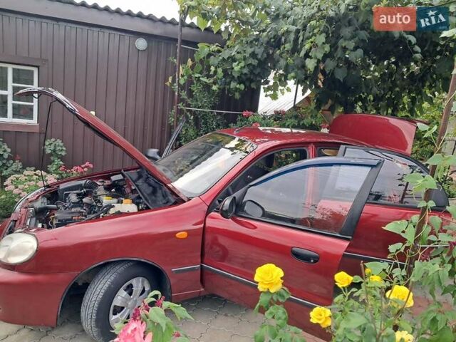 Красный Дэу Ланос, объемом двигателя 1.5 л и пробегом 157 тыс. км за 2450 $, фото 11 на Automoto.ua