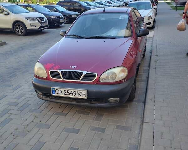 Красный Дэу Ланос, объемом двигателя 1.5 л и пробегом 73 тыс. км за 2000 $, фото 1 на Automoto.ua