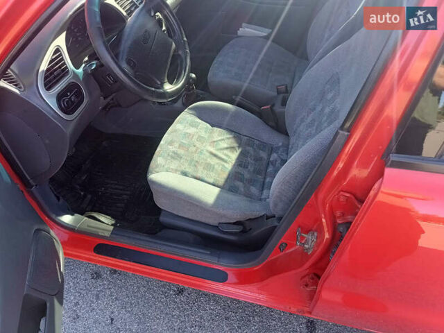 Красный Дэу Ланос, объемом двигателя 1.6 л и пробегом 187 тыс. км за 3150 $, фото 11 на Automoto.ua