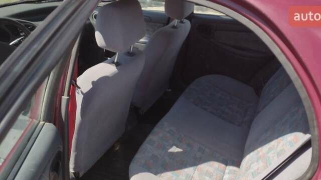 Красный Дэу Ланос, объемом двигателя 1.5 л и пробегом 477 тыс. км за 1250 $, фото 10 на Automoto.ua