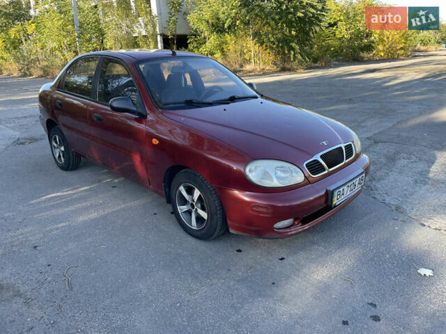Красный Дэу Ланос, объемом двигателя 1.5 л и пробегом 200 тыс. км за 2150 $, фото 1 на Automoto.ua