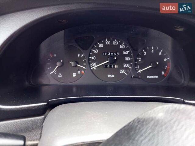 Червоний Деу Ланос, об'ємом двигуна 1.5 л та пробігом 164 тис. км за 1900 $, фото 6 на Automoto.ua