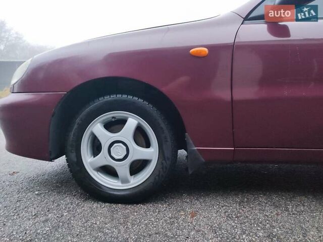 Красный Дэу Ланос, объемом двигателя 1.6 л и пробегом 244 тыс. км за 2850 $, фото 7 на Automoto.ua