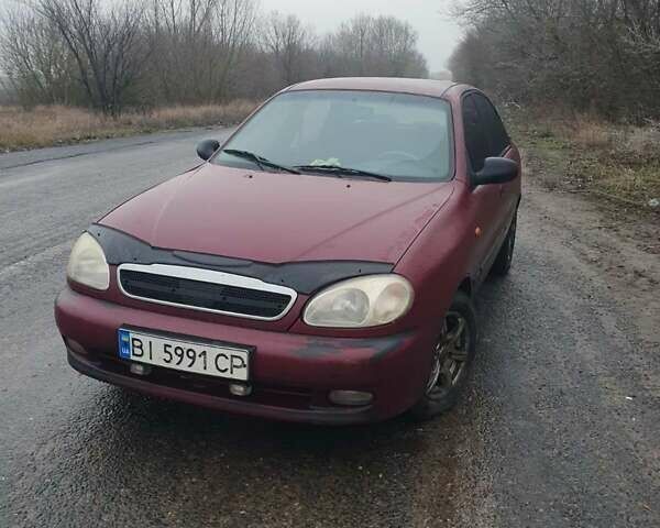 Красный Дэу Ланос, объемом двигателя 1.5 л и пробегом 226 тыс. км за 2400 $, фото 1 на Automoto.ua