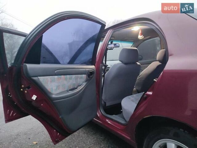 Красный Дэу Ланос, объемом двигателя 1.6 л и пробегом 244 тыс. км за 2850 $, фото 2 на Automoto.ua