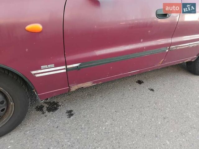 Червоний Деу Ланос, об'ємом двигуна 1.5 л та пробігом 286 тис. км за 1500 $, фото 10 на Automoto.ua