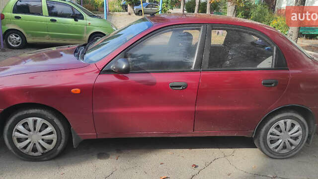 Красный Дэу Ланос, объемом двигателя 1.5 л и пробегом 180 тыс. км за 2300 $, фото 1 на Automoto.ua
