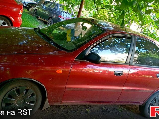Красный Дэу Ланос, объемом двигателя 1.5 л и пробегом 161 тыс. км за 1300 $, фото 4 на Automoto.ua