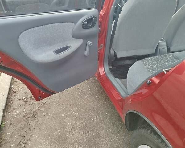 Красный Дэу Ланос, объемом двигателя 1.5 л и пробегом 216 тыс. км за 2500 $, фото 14 на Automoto.ua