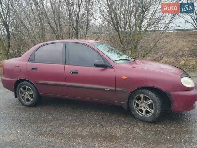Красный Дэу Ланос, объемом двигателя 1.5 л и пробегом 226 тыс. км за 2400 $, фото 5 на Automoto.ua