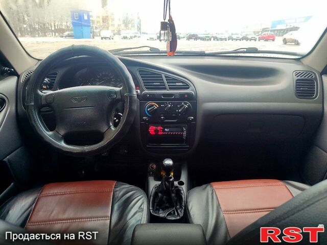 Красный Дэу Ланос, объемом двигателя 1.5 л и пробегом 150 тыс. км за 2700 $, фото 3 на Automoto.ua