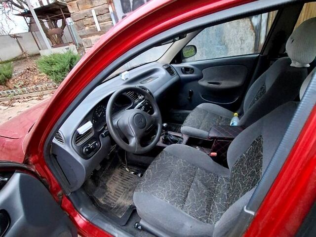 Червоний Деу Ланос, об'ємом двигуна 1.5 л та пробігом 266 тис. км за 1800 $, фото 3 на Automoto.ua