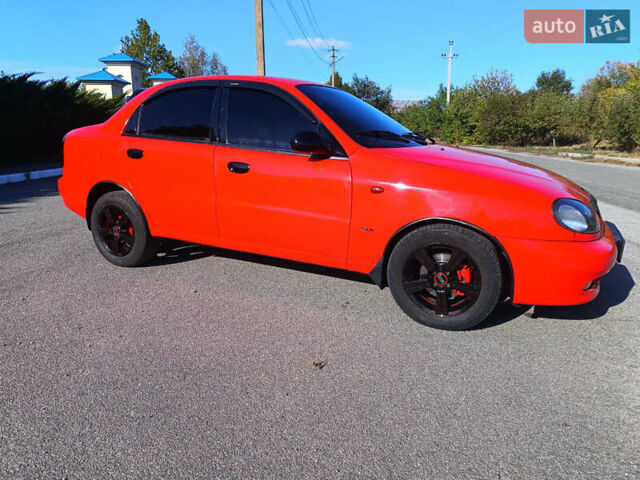 Красный Дэу Ланос, объемом двигателя 1.6 л и пробегом 187 тыс. км за 3150 $, фото 2 на Automoto.ua