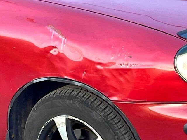 Красный Дэу Ланос, объемом двигателя 1.5 л и пробегом 200 тыс. км за 2800 $, фото 4 на Automoto.ua