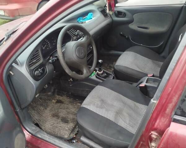 Красный Дэу Ланос, объемом двигателя 1.5 л и пробегом 245 тыс. км за 1100 $, фото 6 на Automoto.ua