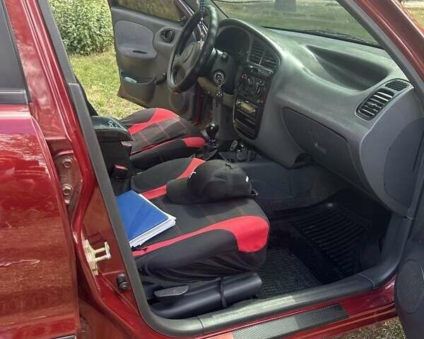 Красный Дэу Ланос, объемом двигателя 1.5 л и пробегом 59 тыс. км за 3750 $, фото 6 на Automoto.ua