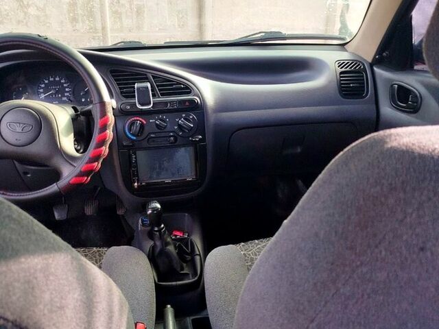 Красный Дэу Ланос, объемом двигателя 1.4 л и пробегом 180 тыс. км за 2400 $, фото 4 на Automoto.ua