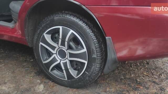 Красный Дэу Ланос, объемом двигателя 1.5 л и пробегом 260 тыс. км за 2500 $, фото 11 на Automoto.ua