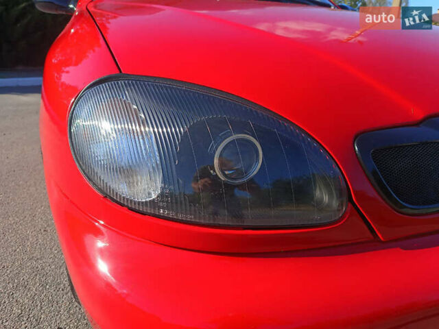 Красный Дэу Ланос, объемом двигателя 1.6 л и пробегом 187 тыс. км за 3150 $, фото 7 на Automoto.ua