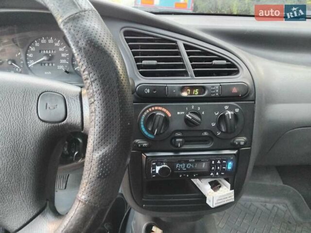 Червоний Деу Ланос, об'ємом двигуна 1.5 л та пробігом 286 тис. км за 1500 $, фото 20 на Automoto.ua