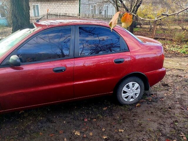 Красный Дэу Ланос, объемом двигателя 1.4 л и пробегом 180 тыс. км за 2400 $, фото 6 на Automoto.ua