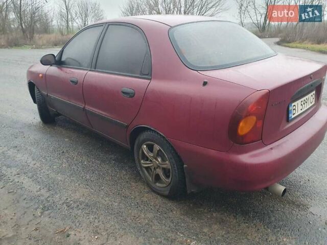 Красный Дэу Ланос, объемом двигателя 1.5 л и пробегом 226 тыс. км за 2400 $, фото 3 на Automoto.ua