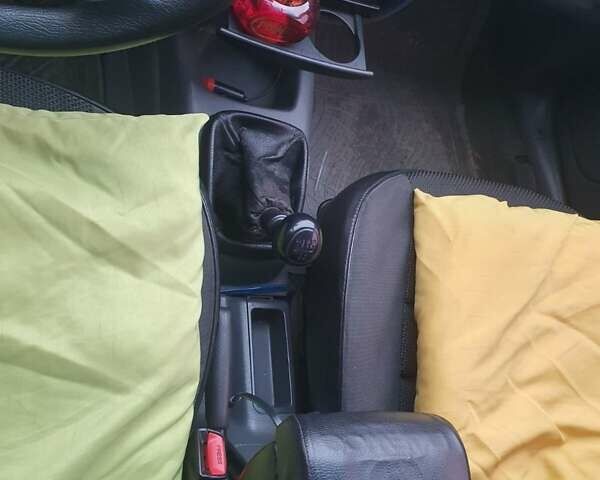 Красный Дэу Ланос, объемом двигателя 1.5 л и пробегом 226 тыс. км за 2400 $, фото 17 на Automoto.ua