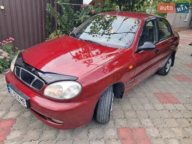 Красный Дэу Ланос, объемом двигателя 1.5 л и пробегом 157 тыс. км за 2450 $, фото 1 на Automoto.ua