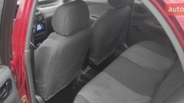 Красный Дэу Ланос, объемом двигателя 1.5 л и пробегом 260 тыс. км за 2500 $, фото 8 на Automoto.ua