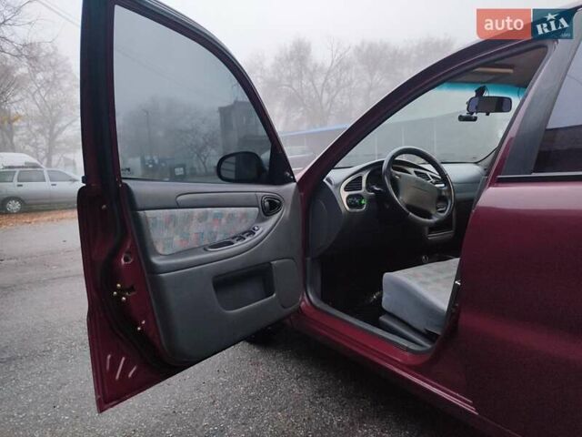 Красный Дэу Ланос, объемом двигателя 1.6 л и пробегом 244 тыс. км за 2850 $, фото 4 на Automoto.ua