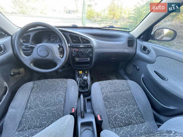 Красный Дэу Ланос, объемом двигателя 1.5 л и пробегом 200 тыс. км за 2150 $, фото 12 на Automoto.ua