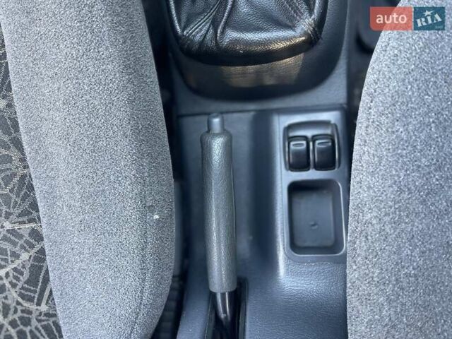 Красный Дэу Ланос, объемом двигателя 1.6 л и пробегом 161 тыс. км за 3300 $, фото 16 на Automoto.ua