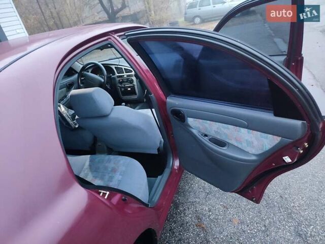 Красный Дэу Ланос, объемом двигателя 1.6 л и пробегом 244 тыс. км за 2850 $, фото 5 на Automoto.ua