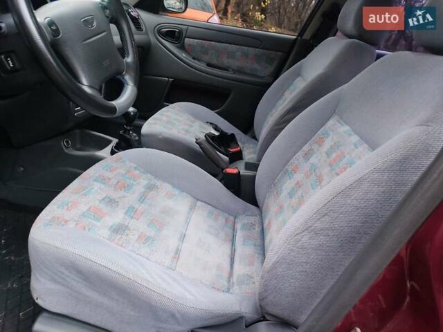 Красный Дэу Ланос, объемом двигателя 1.6 л и пробегом 244 тыс. км за 2850 $, фото 14 на Automoto.ua