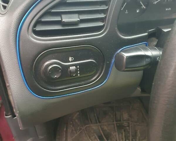 Красный Дэу Ланос, объемом двигателя 1.5 л и пробегом 226 тыс. км за 2400 $, фото 14 на Automoto.ua