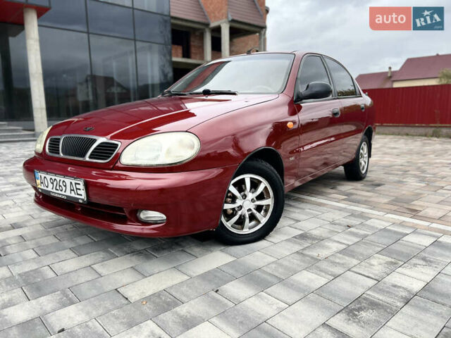 Красный Дэу Ланос, объемом двигателя 1.5 л и пробегом 250 тыс. км за 1950 $, фото 5 на Automoto.ua