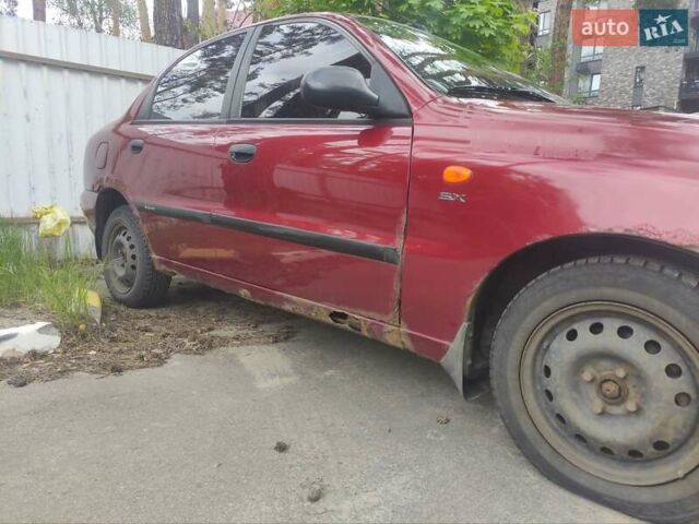 Красный Дэу Ланос, объемом двигателя 1.6 л и пробегом 186 тыс. км за 2200 $, фото 25 на Automoto.ua