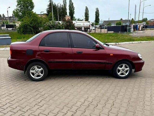 Красный Дэу Ланос, объемом двигателя 1.5 л и пробегом 310 тыс. км за 1950 $, фото 4 на Automoto.ua