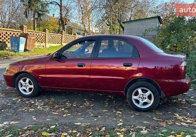 Красный Дэу Ланос, объемом двигателя 1.6 л и пробегом 216 тыс. км за 1900 $, фото 4 на Automoto.ua