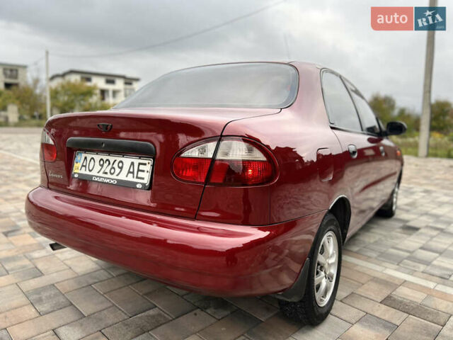Красный Дэу Ланос, объемом двигателя 1.5 л и пробегом 250 тыс. км за 1950 $, фото 8 на Automoto.ua