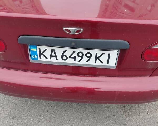 Красный Дэу Ланос, объемом двигателя 1.5 л и пробегом 309 тыс. км за 2200 $, фото 2 на Automoto.ua