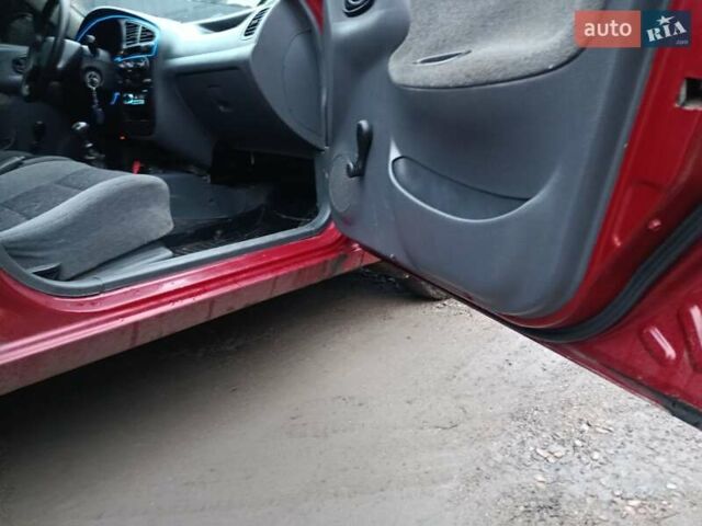 Красный Дэу Ланос, объемом двигателя 1.3 л и пробегом 270 тыс. км за 1500 $, фото 2 на Automoto.ua